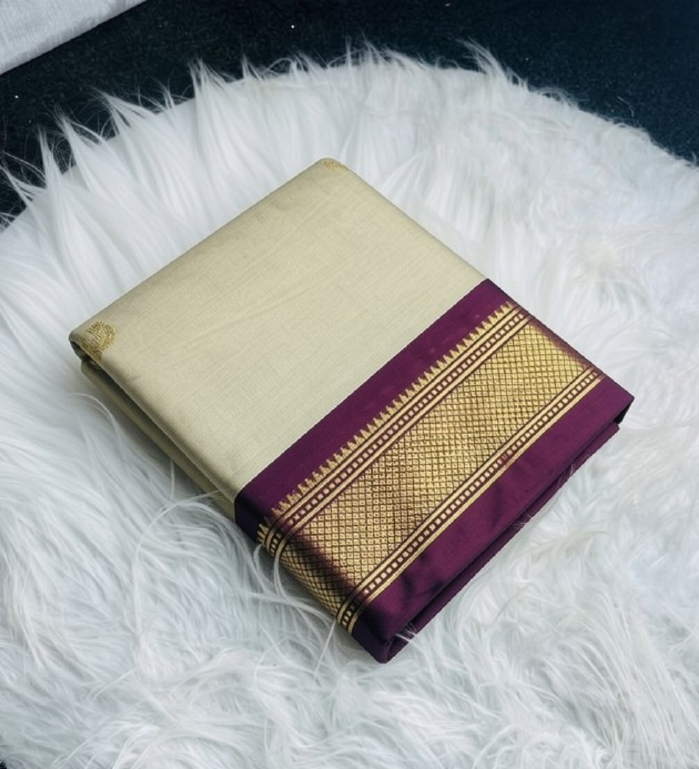 PID-68048-Women-s-Cotton-Silk-Striped-Saree-With-Unstitched-Blouse-5-5-Mtr-Beige-1.jpg Women's Cotton Silk Solid Saree With Unstitched Blouse - 5.5 Mtr (Cream-Wine) - Image 1