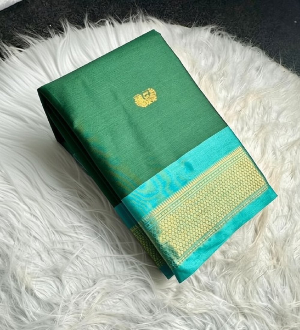 PID-68052-Women-s-Cotton-Silk-Striped-Saree-With-Unstitched-Blouse-5-5-Mtr-Green-1.jpg Women's Cotton Silk Solid Saree With Unstitched Blouse - 5.5 Mtr (Dark Green-Turquoise) - Image 1