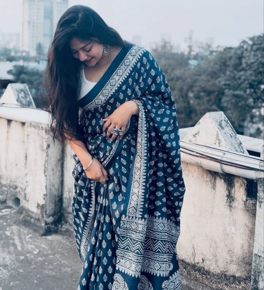 PID-68079-Women-s-Linen-Floral-Printed-Saree-With-Unstitched-Blouse-5-5-Mtr-Sky-1.jpg Women's Linen Printed Saree With Unstitched Blouse - 5.5 Mtr (Navy Blue) - Image 1