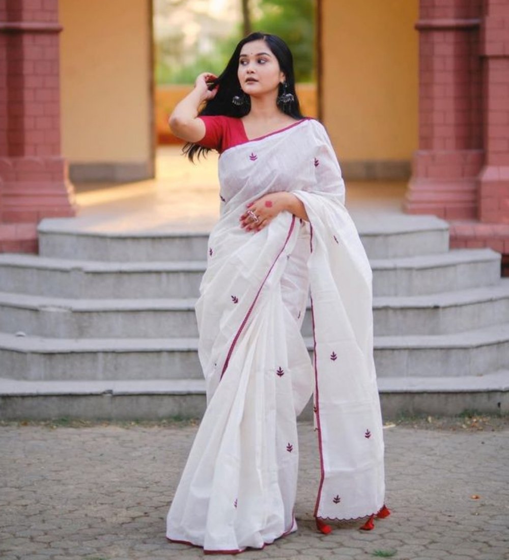 PID-68080-Women-s-Linen-Kalamkari-Printed-Saree-With-Unstitched-Blouse-5-5-Mtr-Yellow-1.jpg Women's Linen Embroidered Saree With Unstitched Blouse - 5.5 Mtr (White-Red) - Image 1